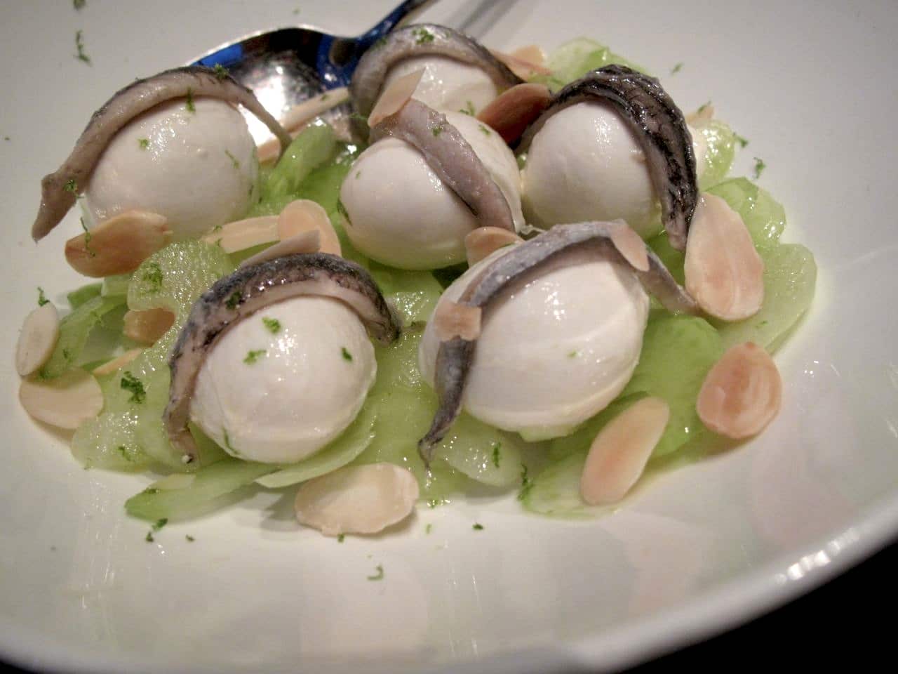 A salad of celery, mozzarella, almonds and anchovies at Ascari Enoteca in Toronto.