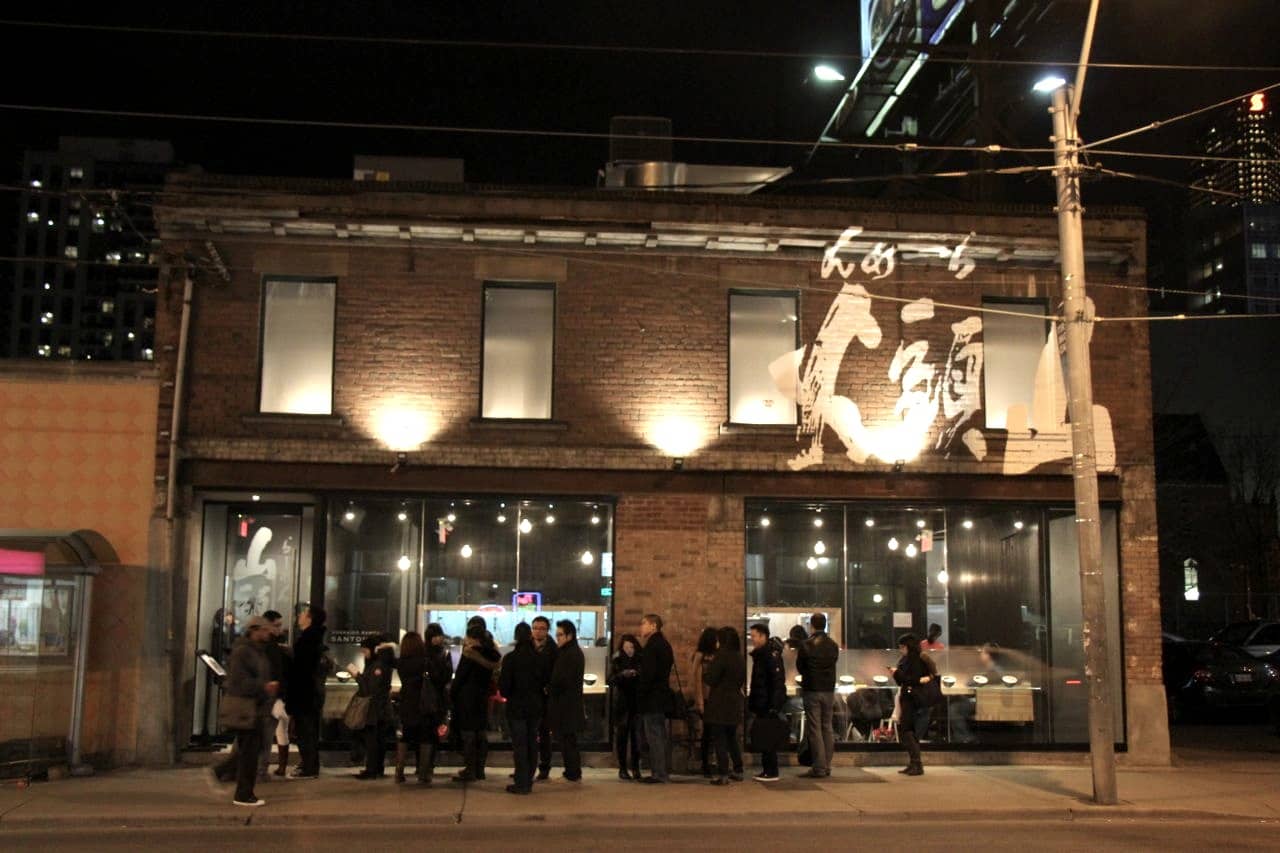 Ramen lovers line up down Dundas Street East for Santouka Ramen Toronto.