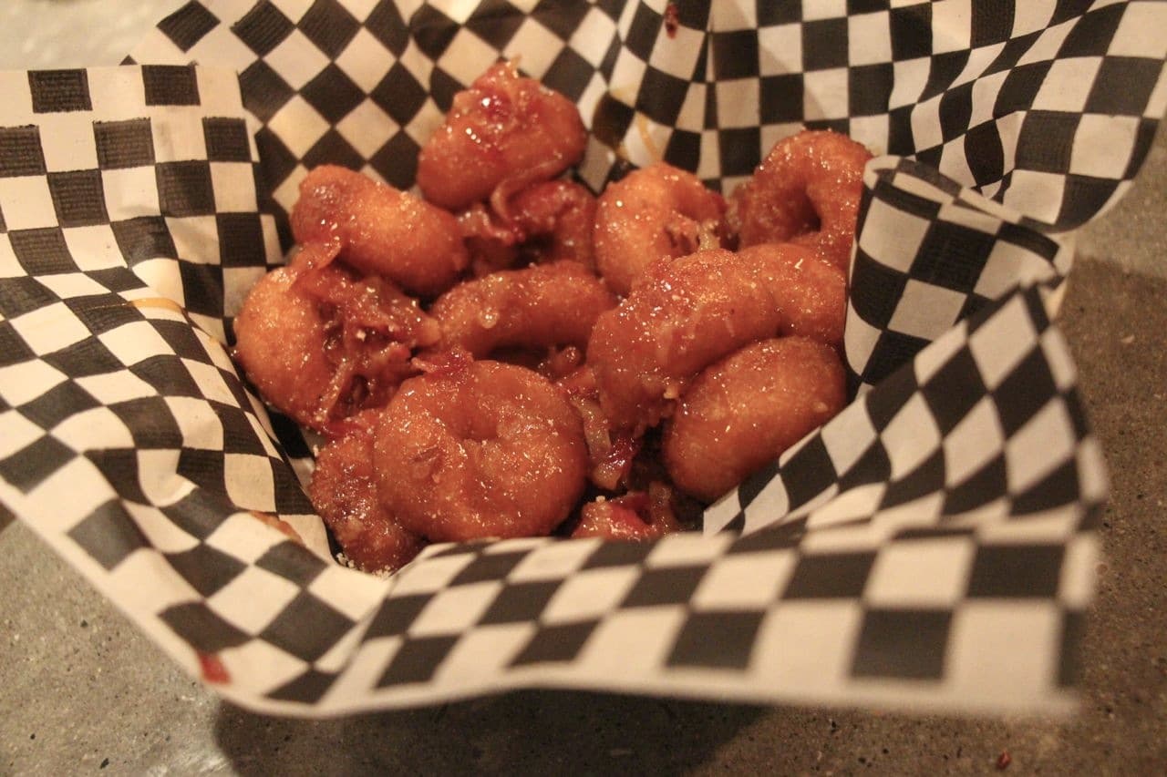 Donuts with maple bacon are a popular dessert at Loose Moose Toronto.