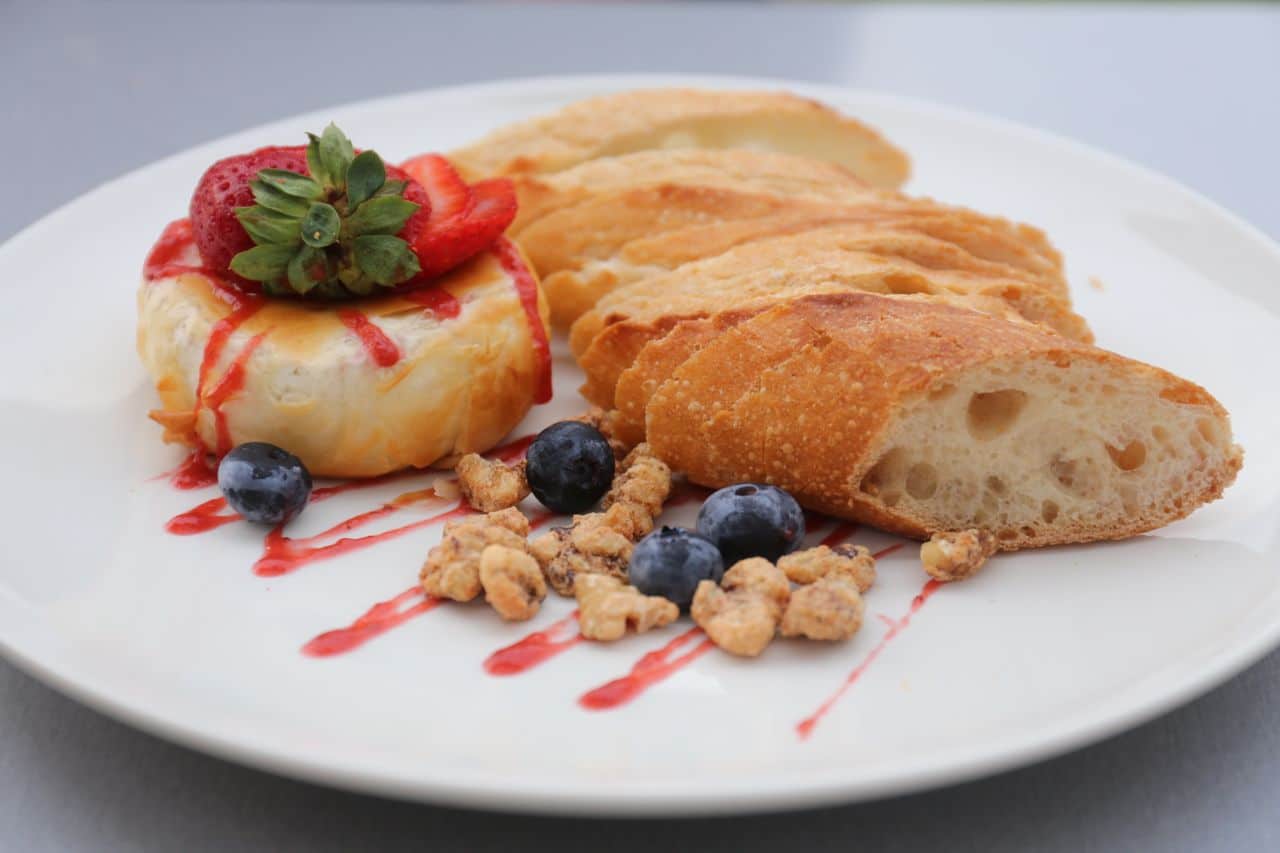 Baked Brie with candied walnuts and fruit chutney at Crash Pad Bistro.