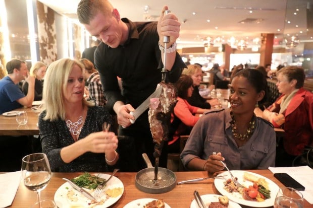 Tableside sliced Brazilian steak at Copacabana Toronto.