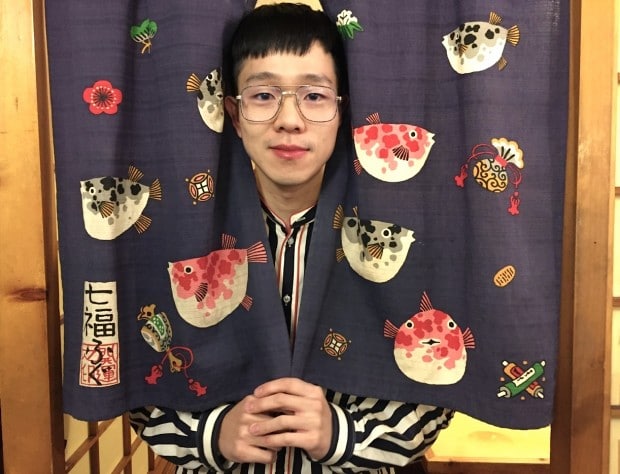 Decorative curtains lead to private dining rooms at Korean Village Restaurant in Toronto.