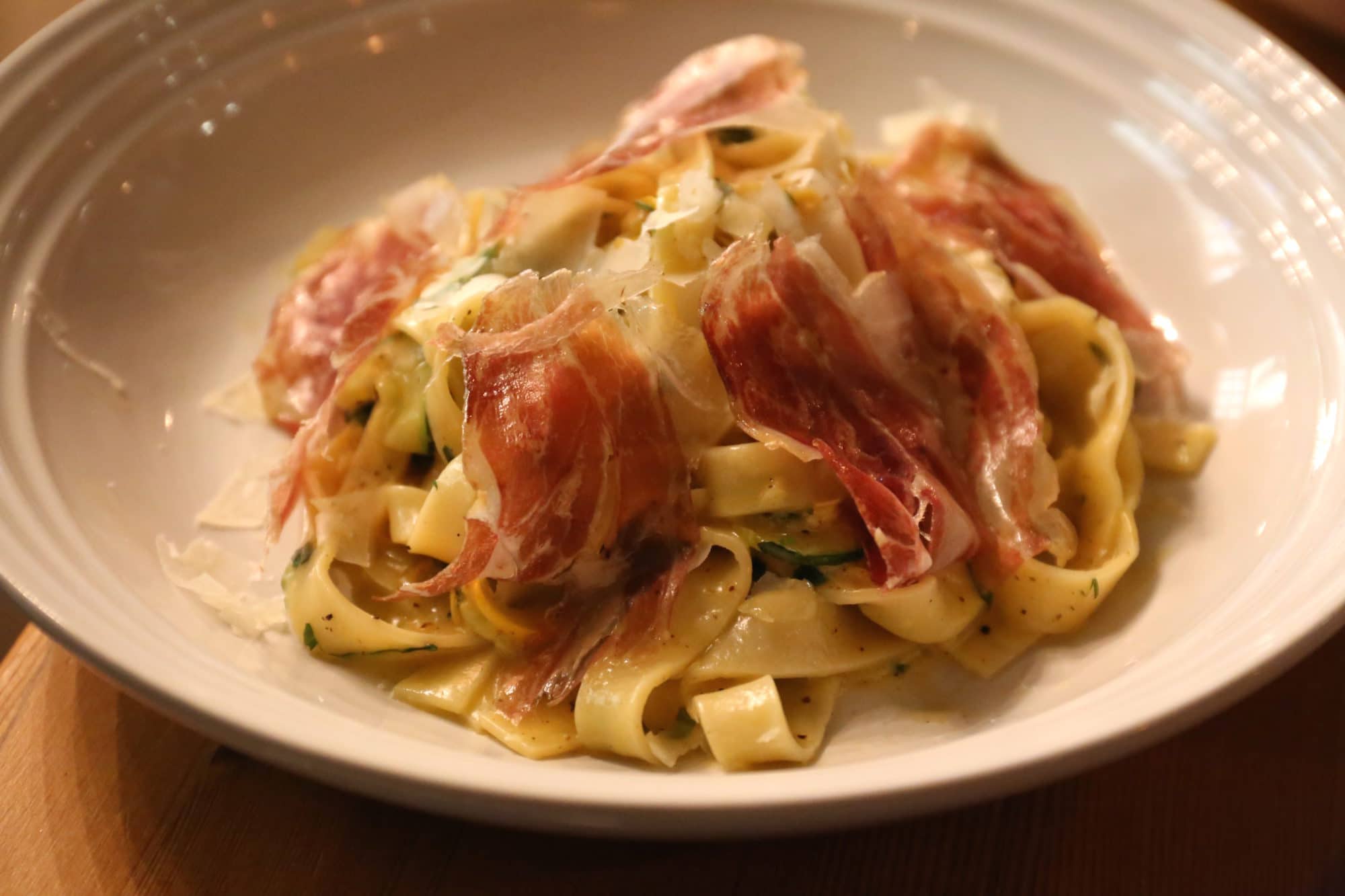 Ayden Saskatoon: Carbonara with tagliatelle, parmesan, yolk, coppa, spring zucchini, black pepper