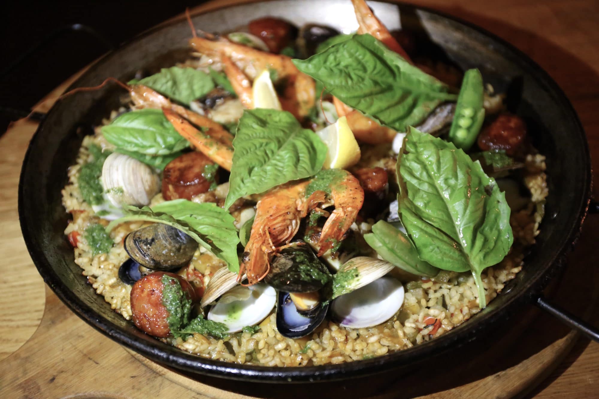Shrimp, clams, mussels, chorizo, chicken and saffron in Carmen Toronto's signature paella.