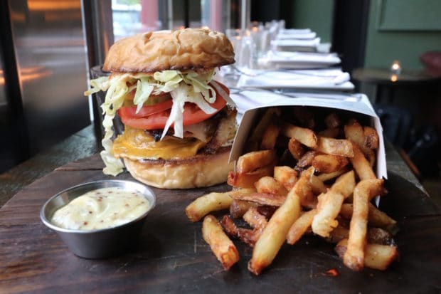 A fully loaded Cheeseburger at The Good Son restaurant.