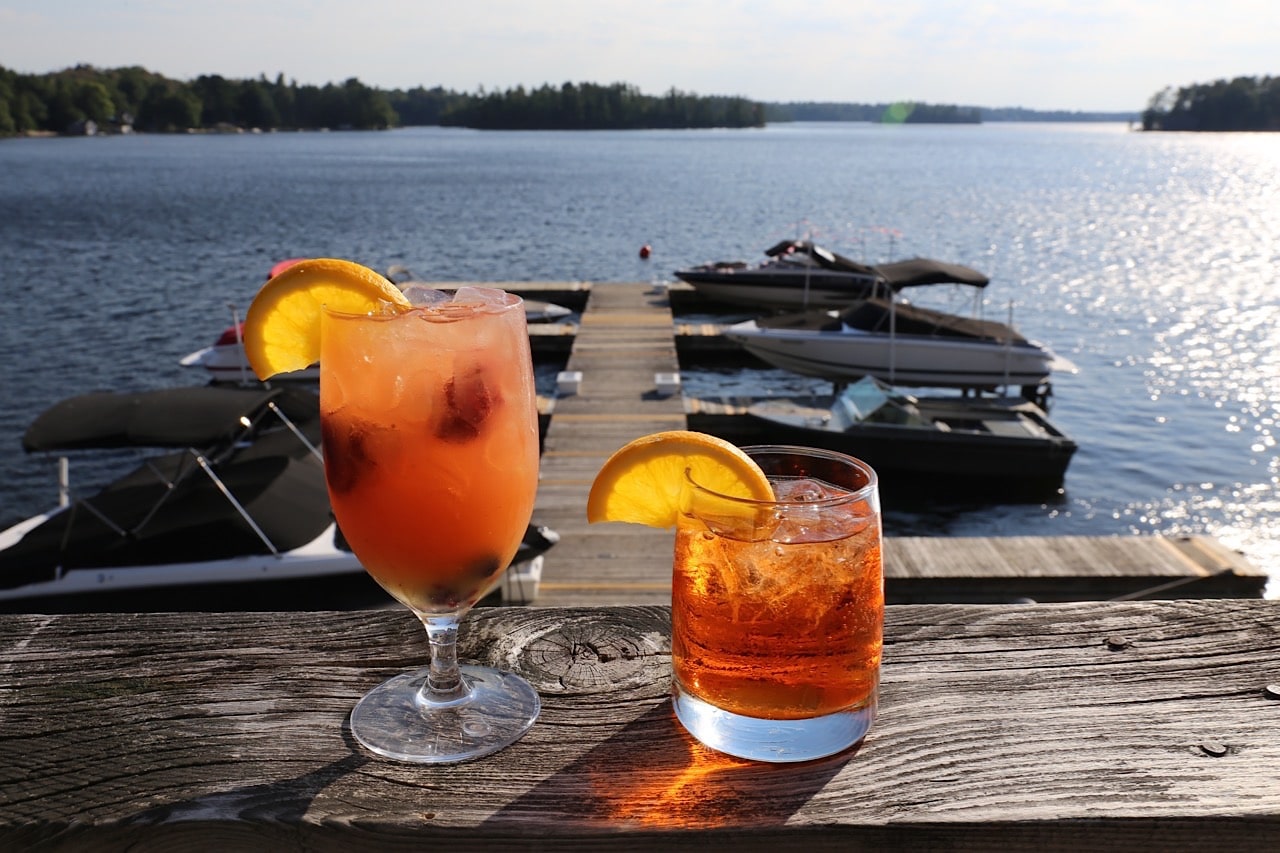 Sip summer cocktails at Taboo Resort's lakeside bar.