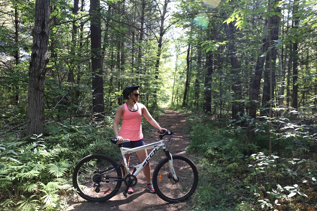 Peddle a mountain bike through nearby forest trails.