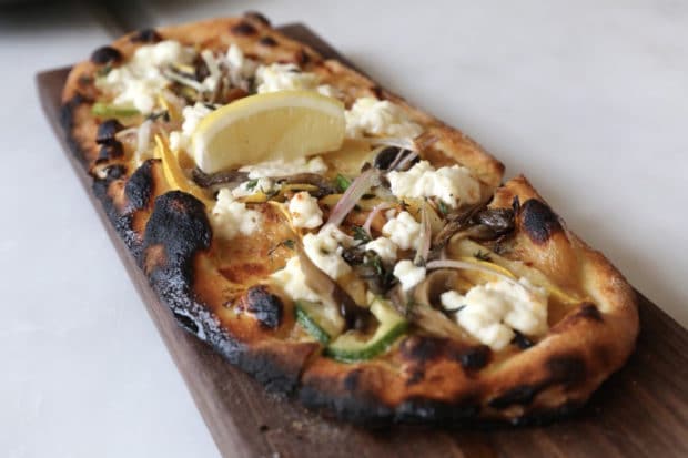 Get delicious gourmet pizza delivered to your door via La Palma on Dundas West.