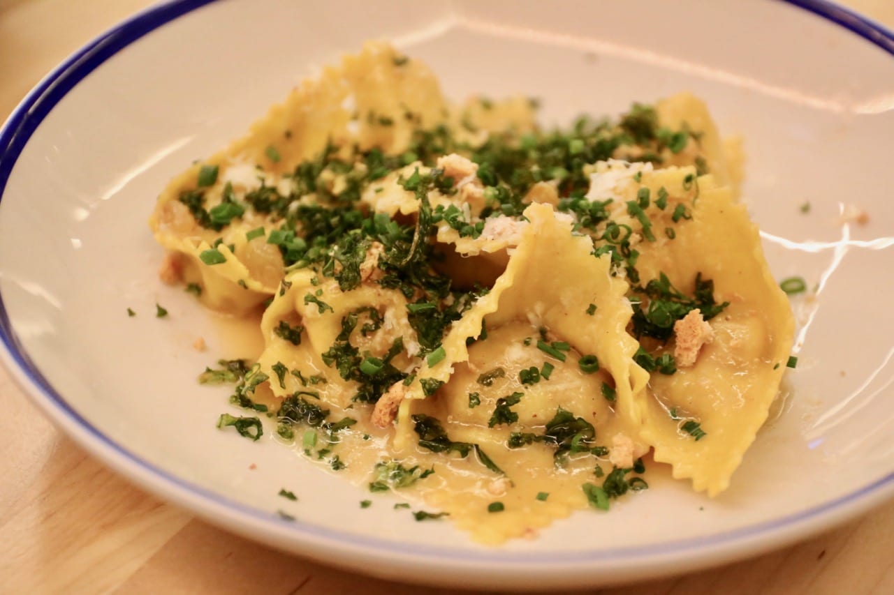 Amano Pasta: Little Boats Casoncelle with salumi and mortadella filling, amaretti, pickled raisin, crispy kale