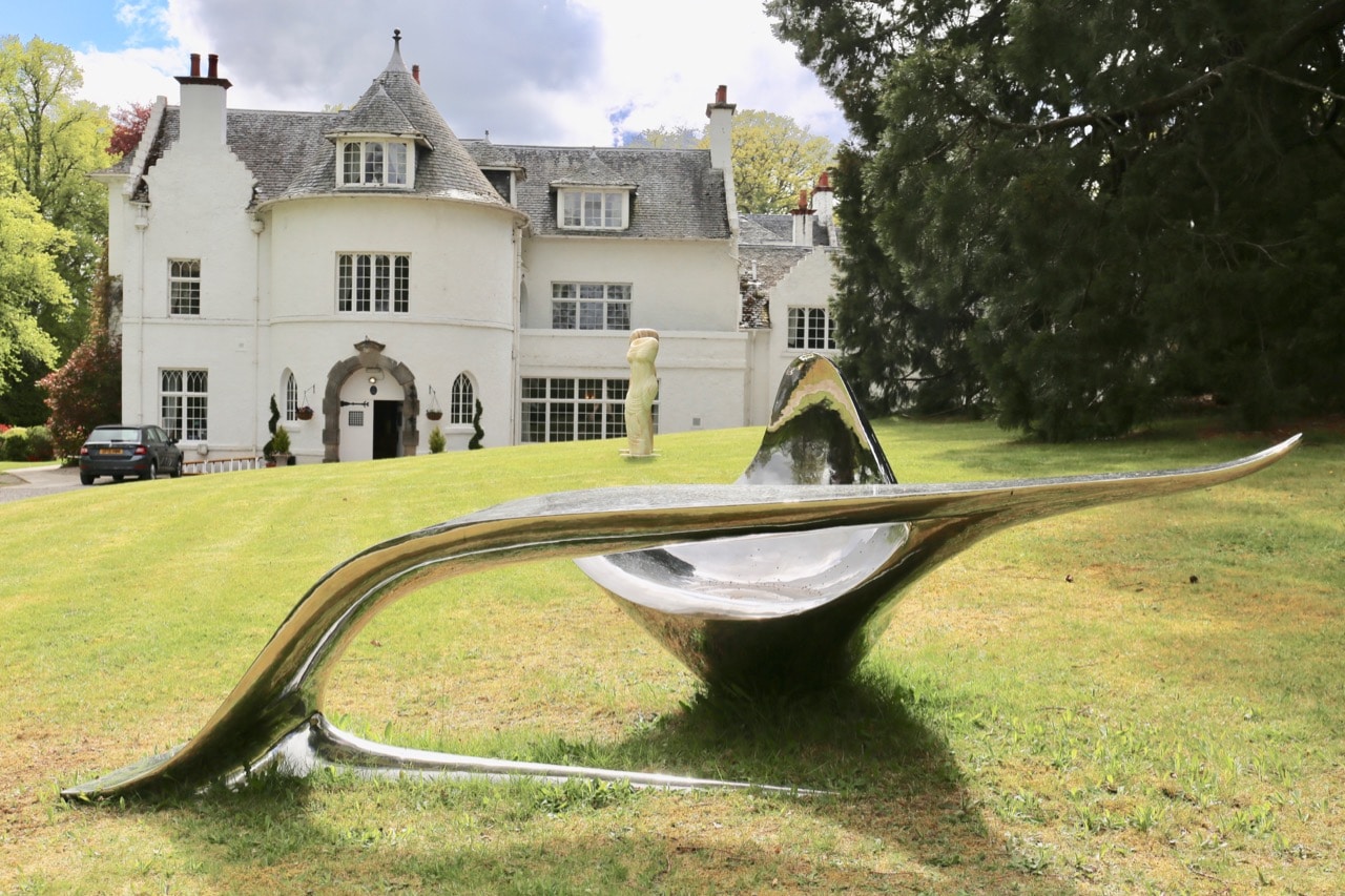 Achnagairn Castle's gorgeous estate is decorated in contemporary art and sculptures.