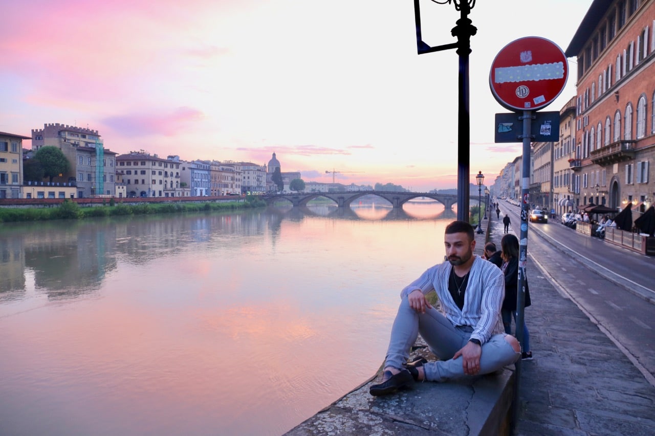 Enjoy a romantic sunset stroll along the Arno River.