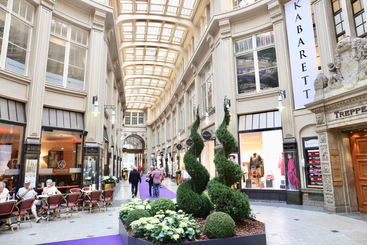 Fashionistas on a gay Leipzig getaway enjoy shopping at boutiques in The Madler Passage.