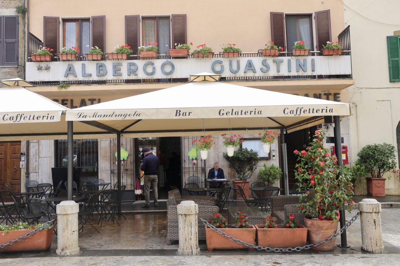 Albergo Guastini is located directly in front of the Tuscan village's main entrance gate.