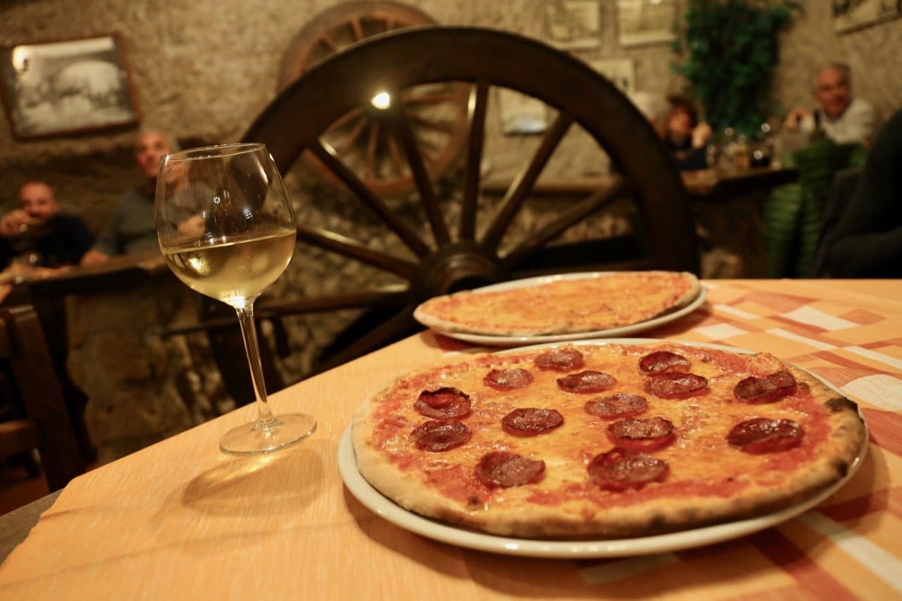 Enjoy a pizza lunch paired with local Tuscan wine at Il Noce Trattoria.