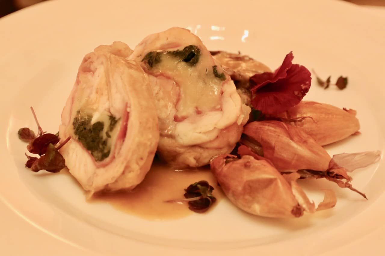 Roasted rabbit with pecorino and salumi.