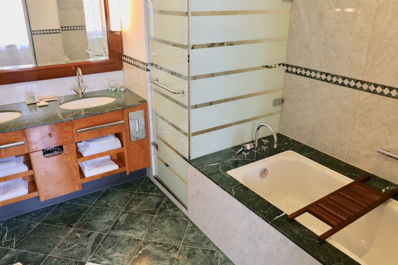 Marble-clad bathrooms at the Furstenhof Hotel offer bathtub and shower.