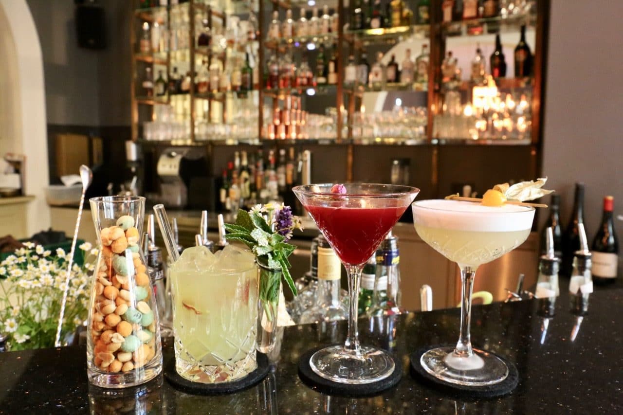 Nibble on bar snacks and sip a parade of craft cocktails The Kaminabar.