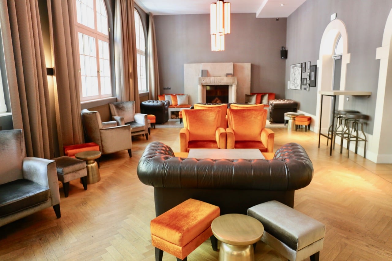 Chic furniture adorns the hotel's Fireplace Room.