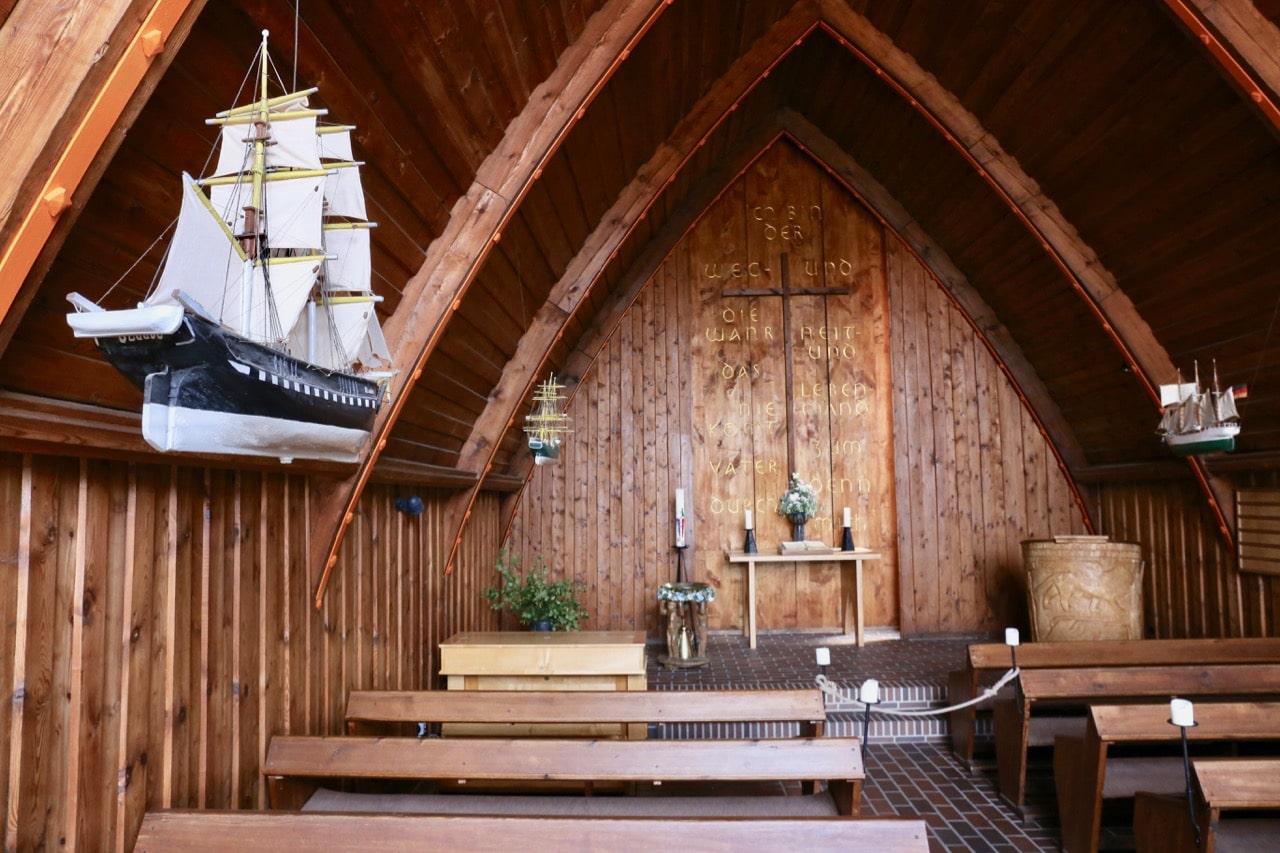 Enjoy an intimate service at a historic church when visiting beaches in Germany.
