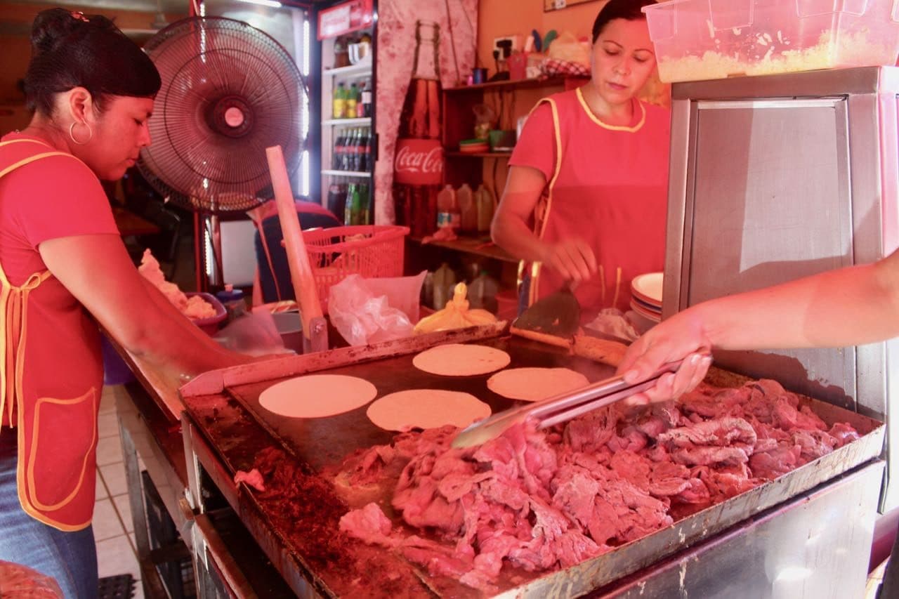 Visit Pitillal and wait patiently in line at Taco's Neto. 