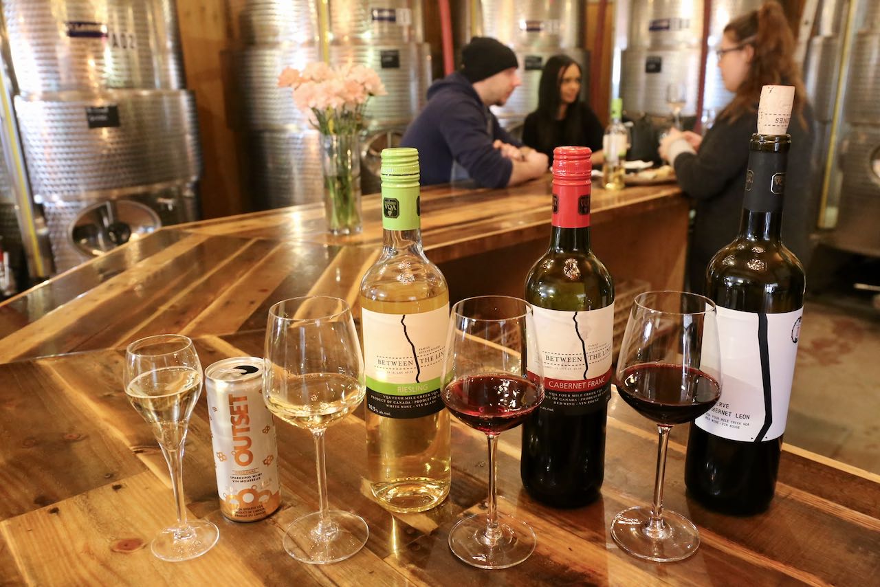 Enjoy a wine tasting at Between the Lines Winery paired with a local cheese board.