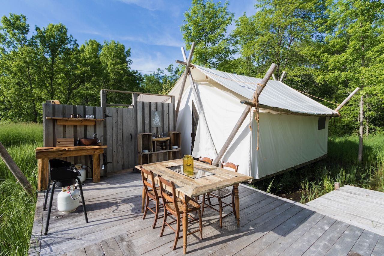 Fronterra Glamping tent and outdoor kitchen in Prince Edward County, Ontario.