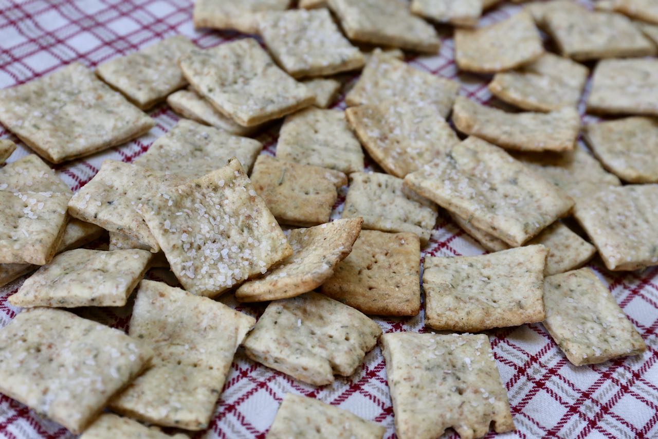 Homemade crackers taste similar to Wheat Thins and are by far one of the easiest Sourdough Discard Recipes.
