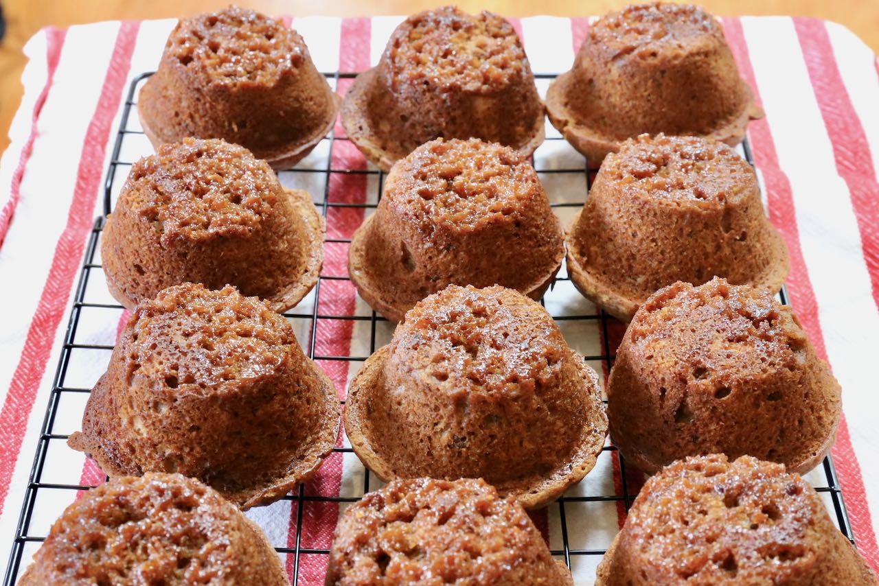 Invert Sticky Toffee Banana and Date Muffins on a cooling rack. 