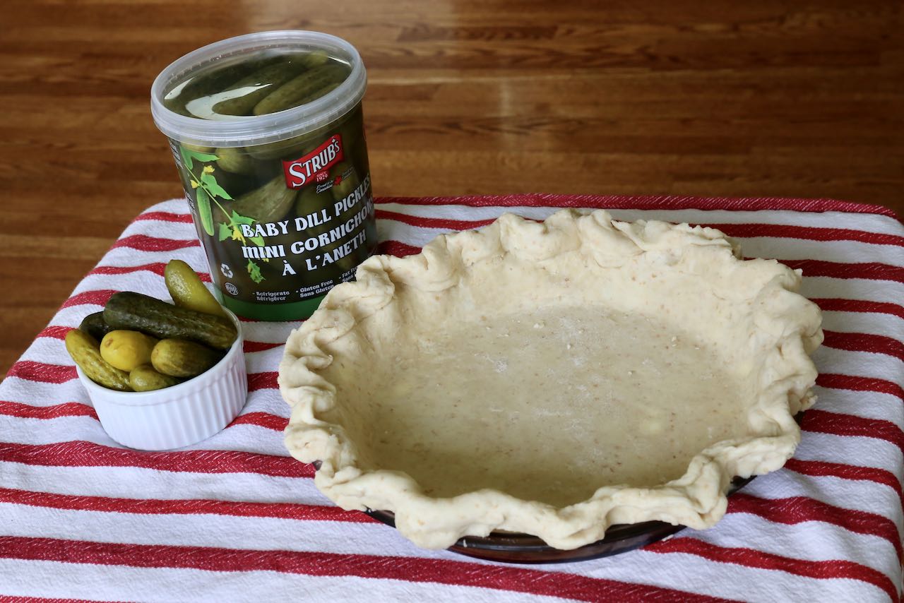 Pre-bake a pie crust before making your Pickle Pie filling.