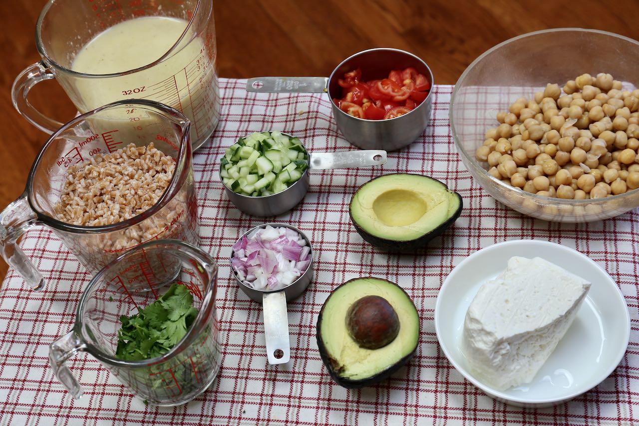 Use fresh vegetables and herbs when making Healthy Garlic Lemon Chickpea Avocado Salad.