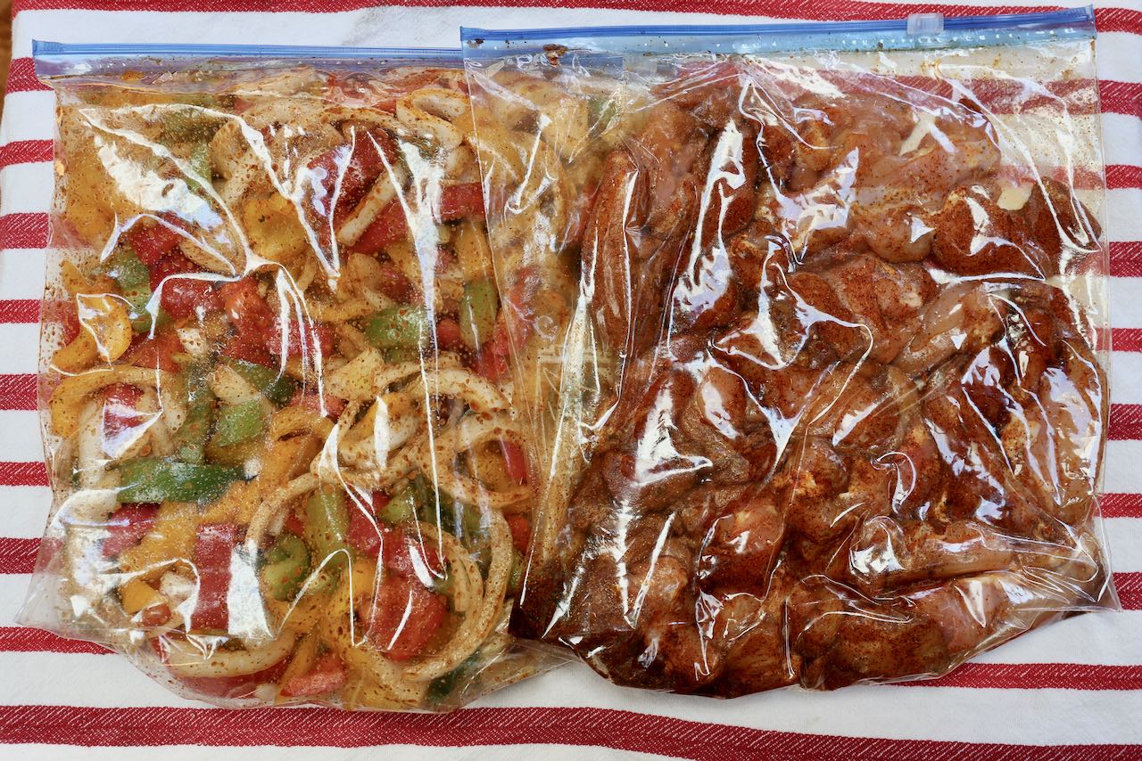 Let mixed vegetables and sliced chicken marinated in spice mix in ziplock bags in the fridge.