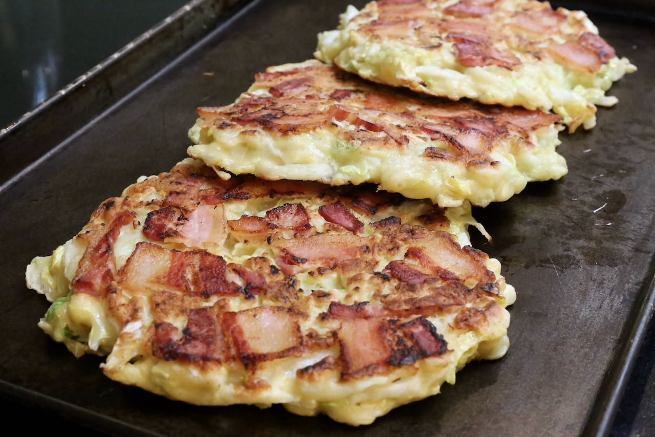 Let Japanese Cabbage Pancakes rest on a baking sheet until ready to serve.