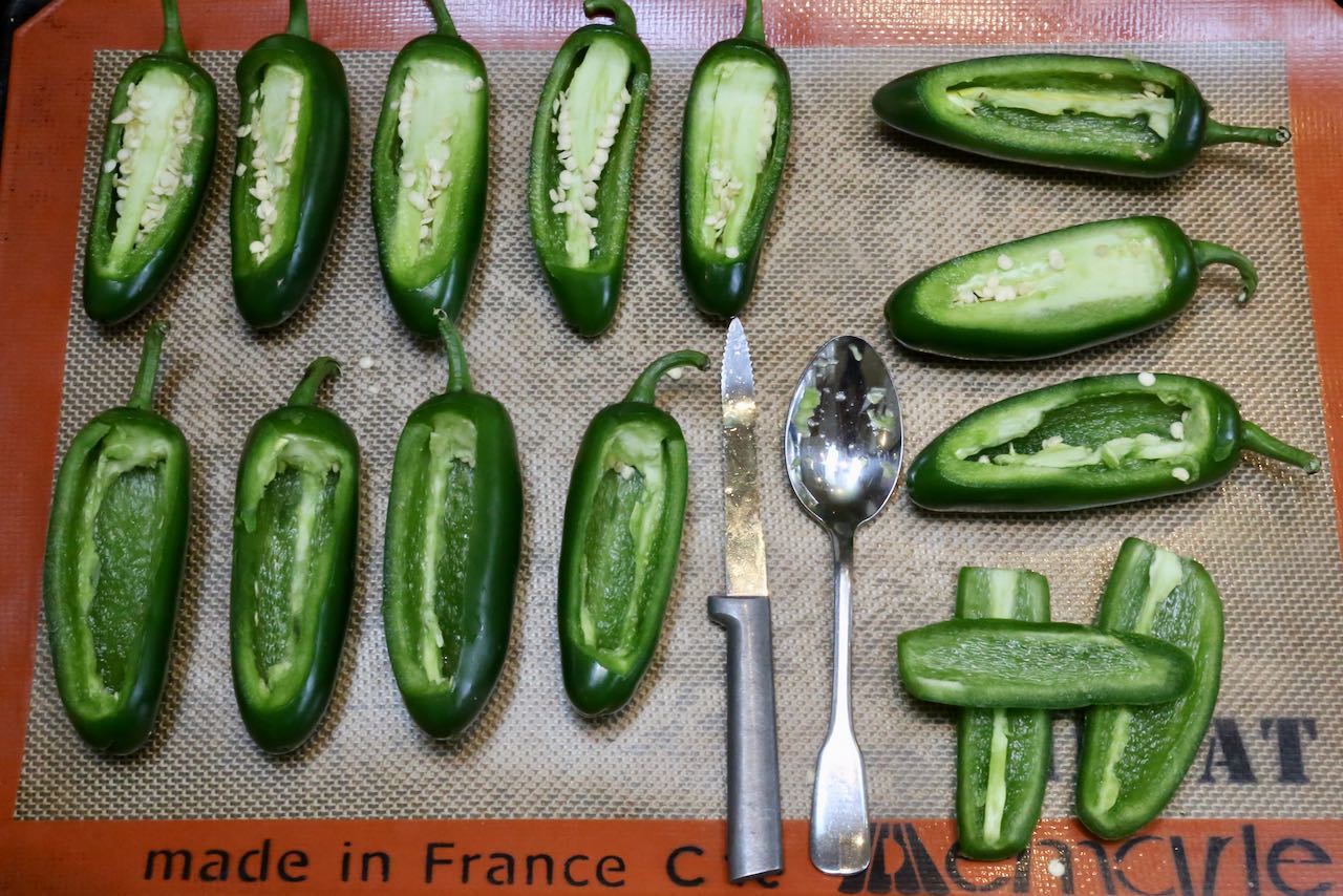Keto Jalapeno Poppers Step 1: Cut peppers into "boats" using a grapefruit knife.