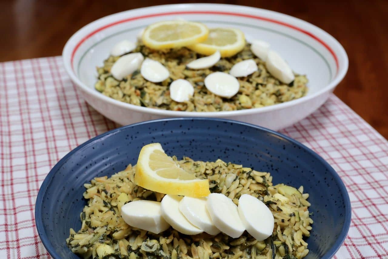 Serve Orzo Lemon Salad warm with sliced bocconcini cheese.