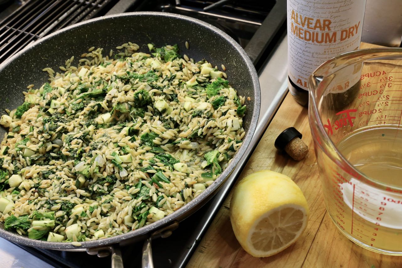 Cook orzo mixture with lemon juice, sherry and chicken stock.