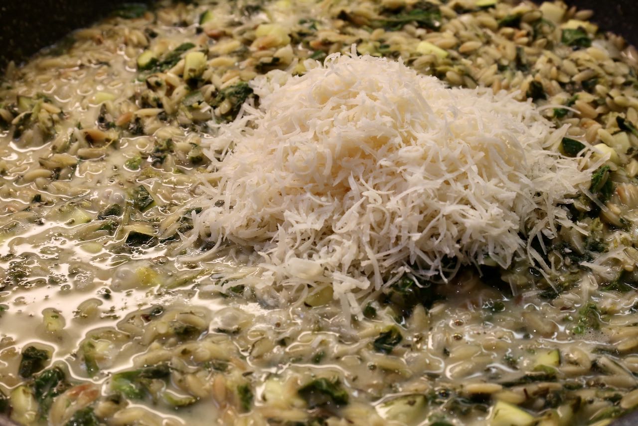 Make the Orzo Lemon Salad creamy by adding grated parmesan cheese.