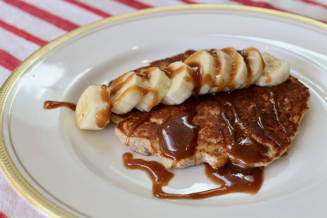 Easy Oat Flour Pancakes have a crunchy exterior and a soft and fluffy interior.