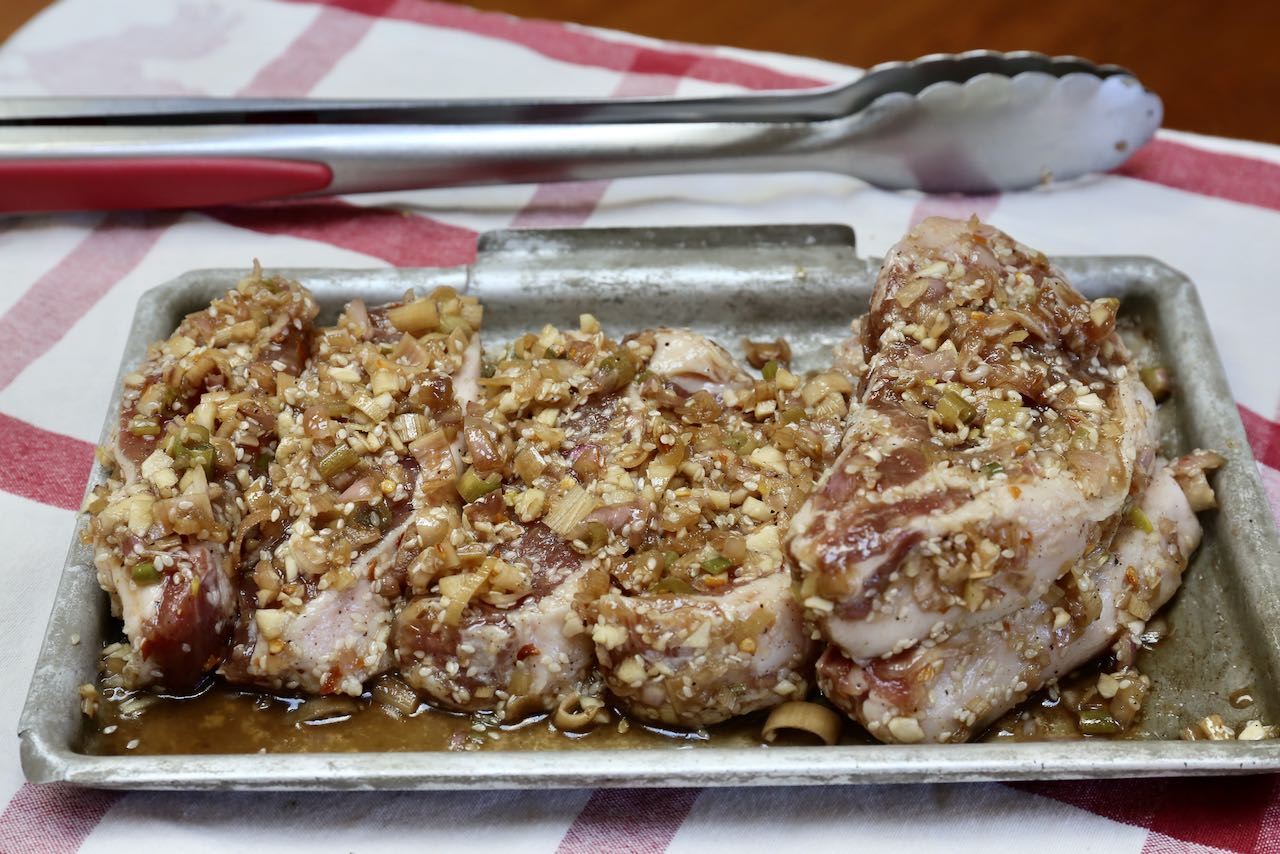 Bun Thit Nuong: Marinated pork ready to grill on the barbecue.