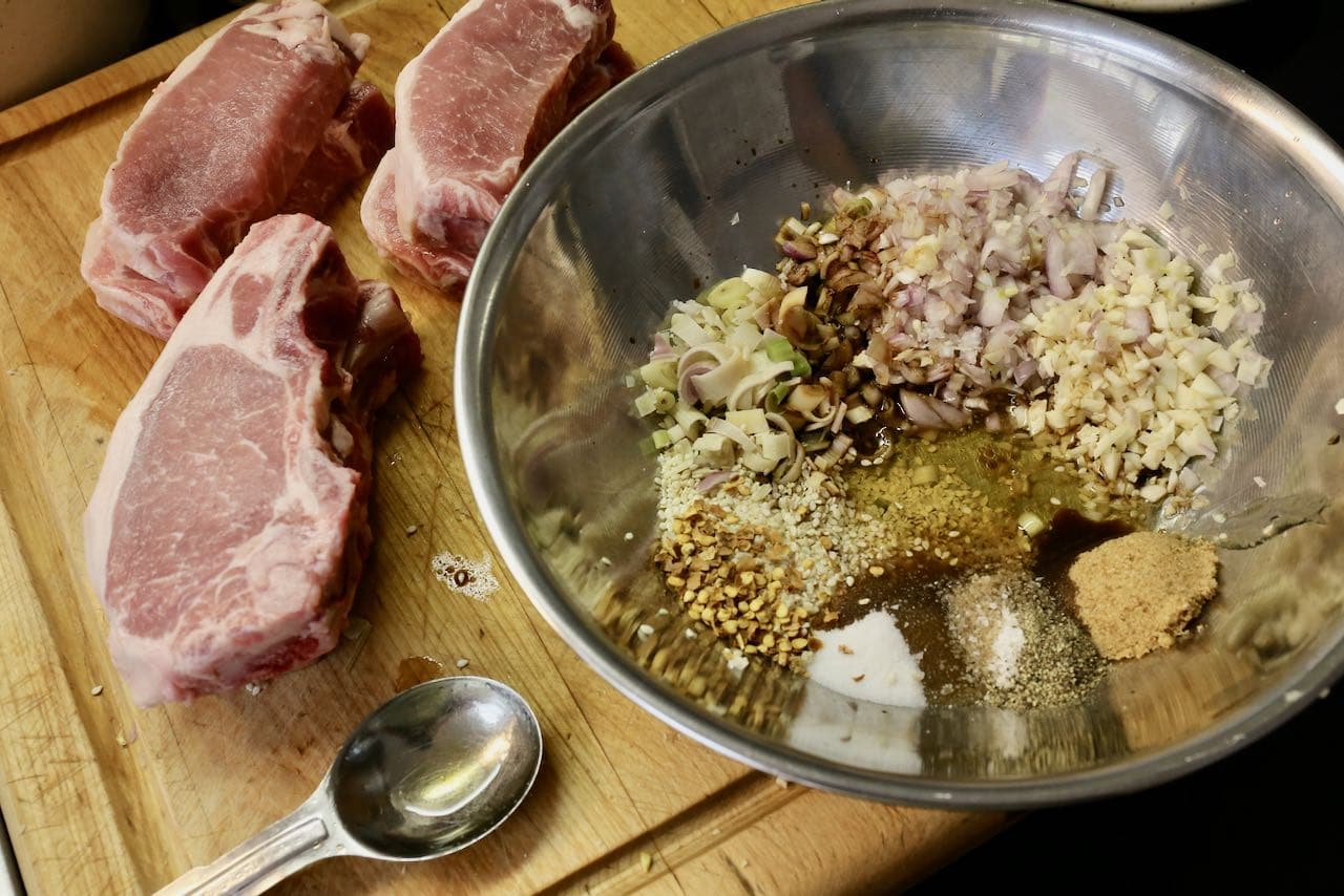 Prepare Vietnamese Grilled Pork marinade in a mixing bowl.
