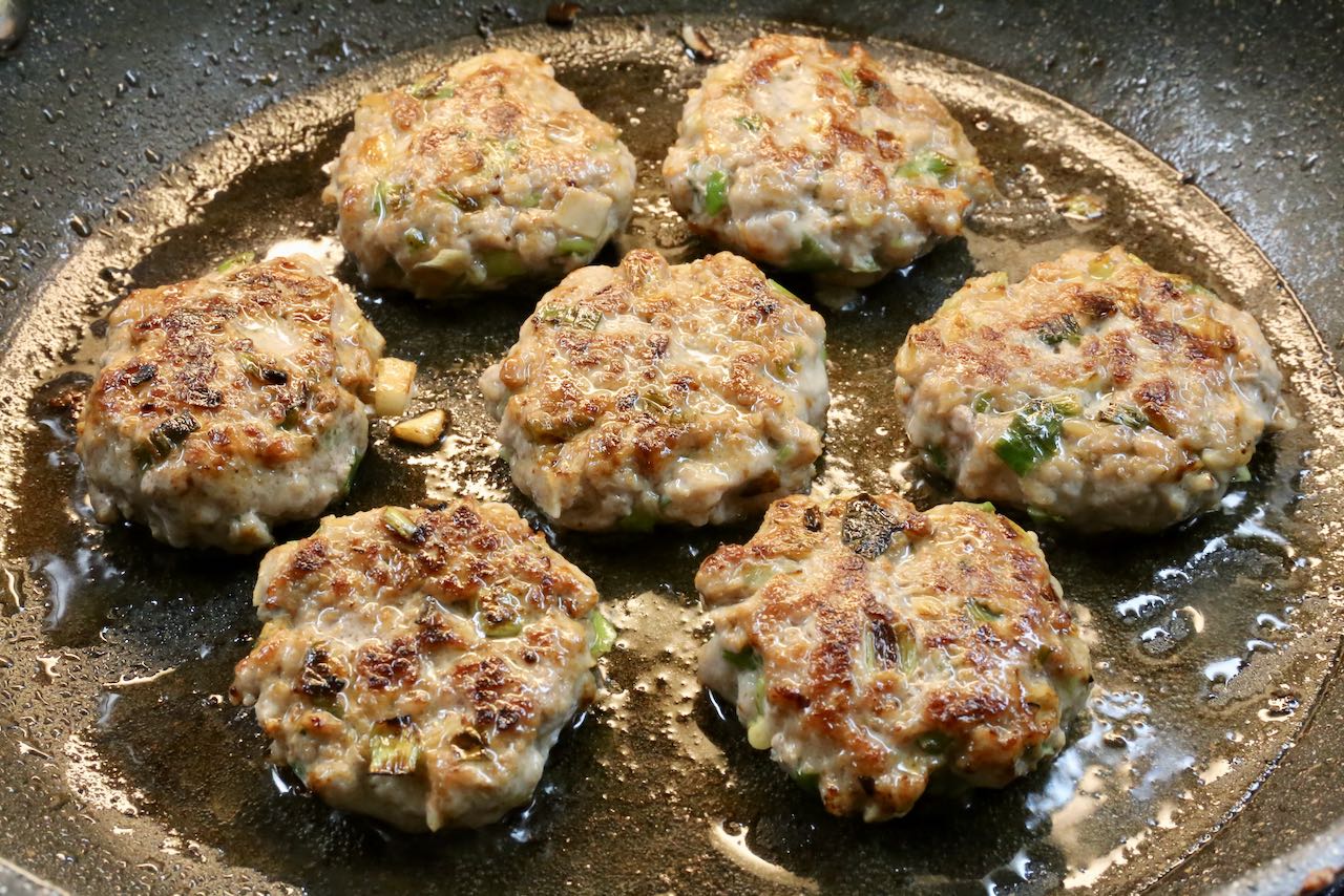 Fry Bun Cha in a skillet on both sides until crisp and browned.
