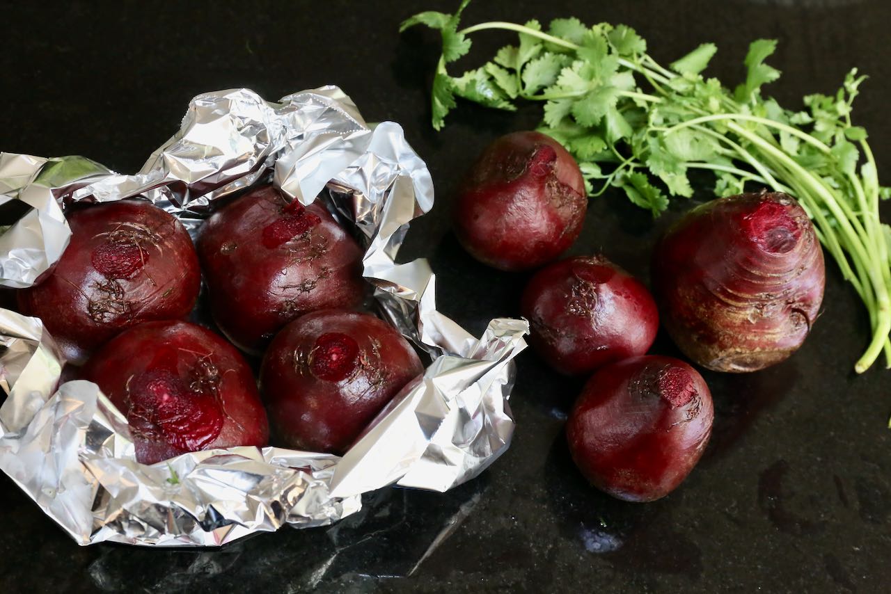 Roast beets in tin foil so they steam in the oven and develop a tender texture. 