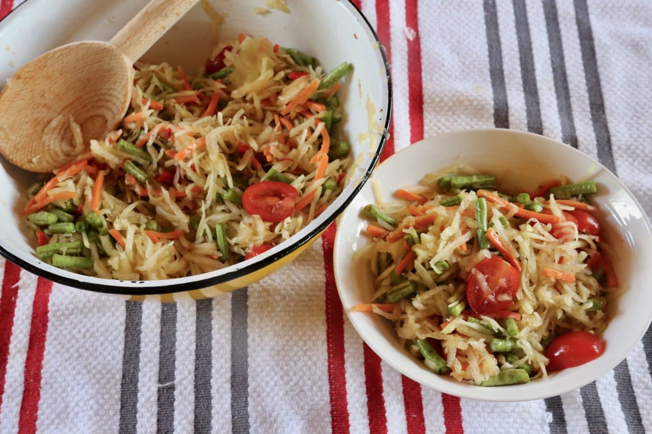 Serve Laos Papaya Salad in a large bowl at the table family-style or in small salad bowls.