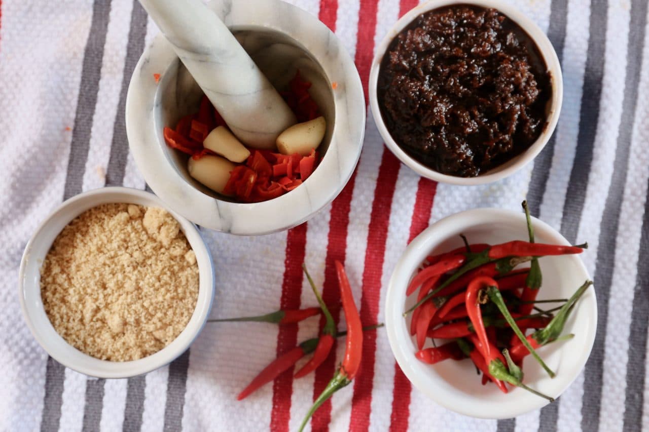 Traditionally Laos Papaya Salad dressing is made in a mortar and pestle.