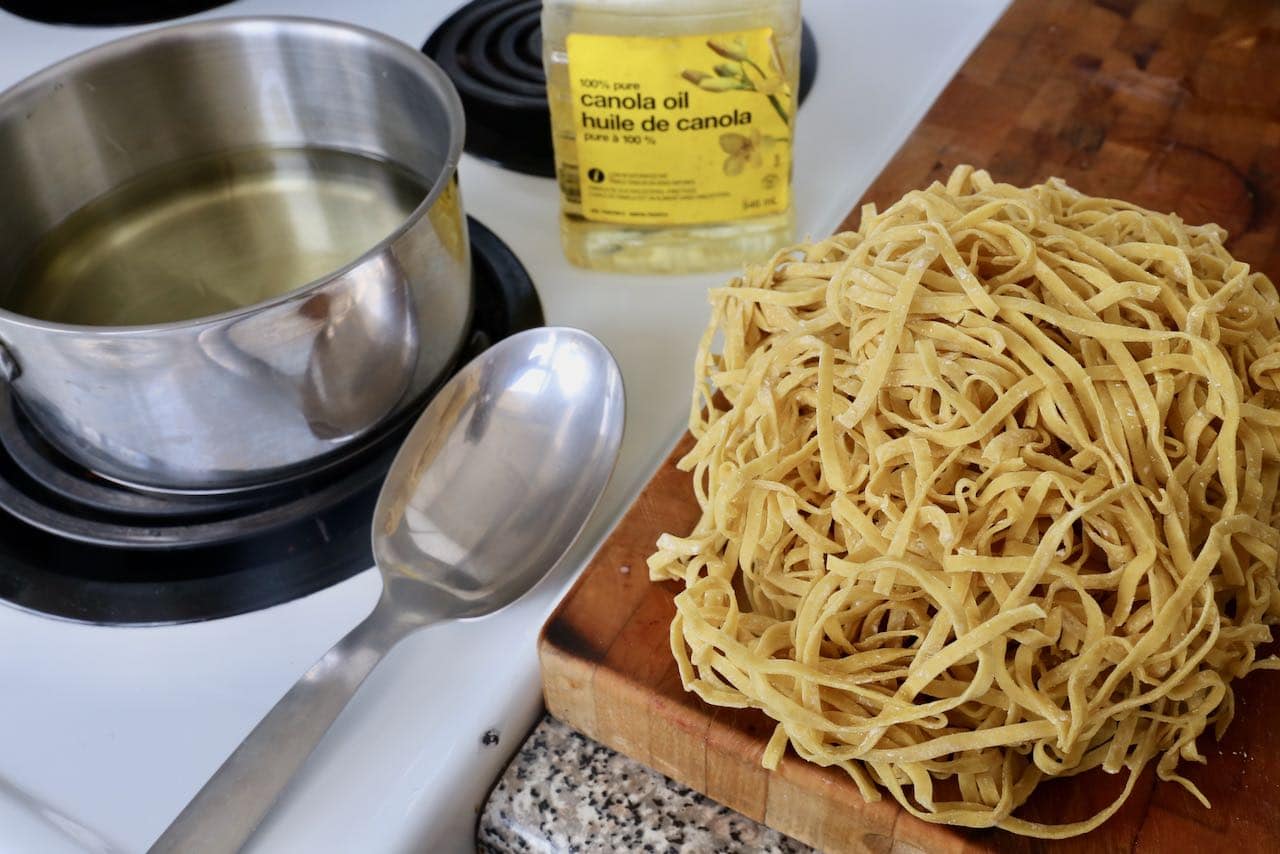 Deep fry fresh Chinese egg noodles for Khao Soi's distinctive crunchy topping. 