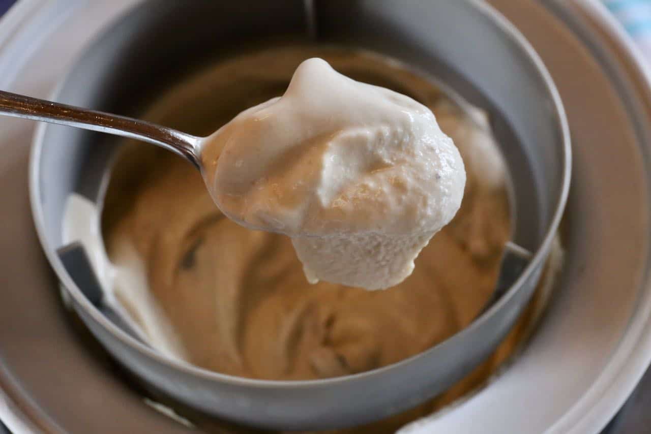 You'll know the ice cream base is done when you scoop it with a spoon and it's the consistency of soft serve.