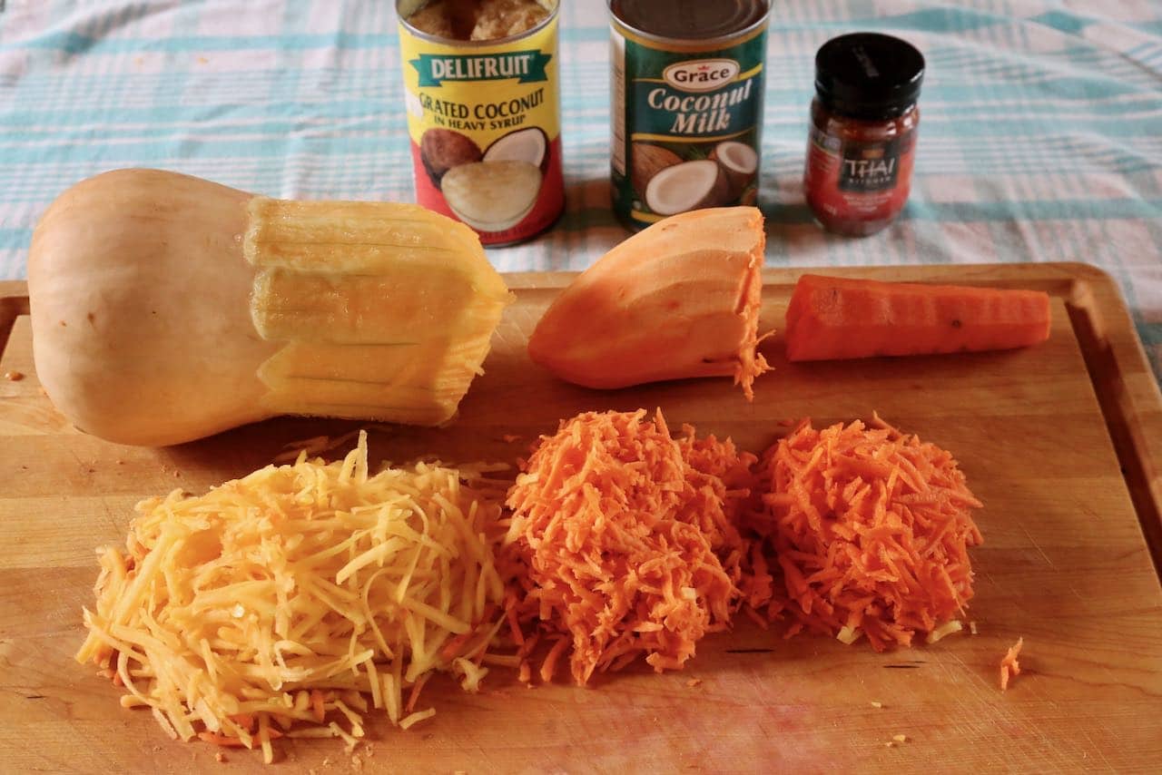Prep Grabong fritters by grating pumpkin, sweet potato and carrot.