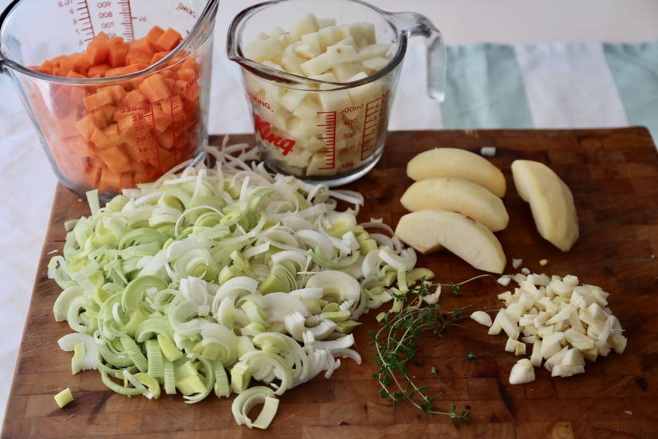 Carrot and Leek Soup Step 1: Dice carrots, potato and apples. Slice leeks and mince garlic.