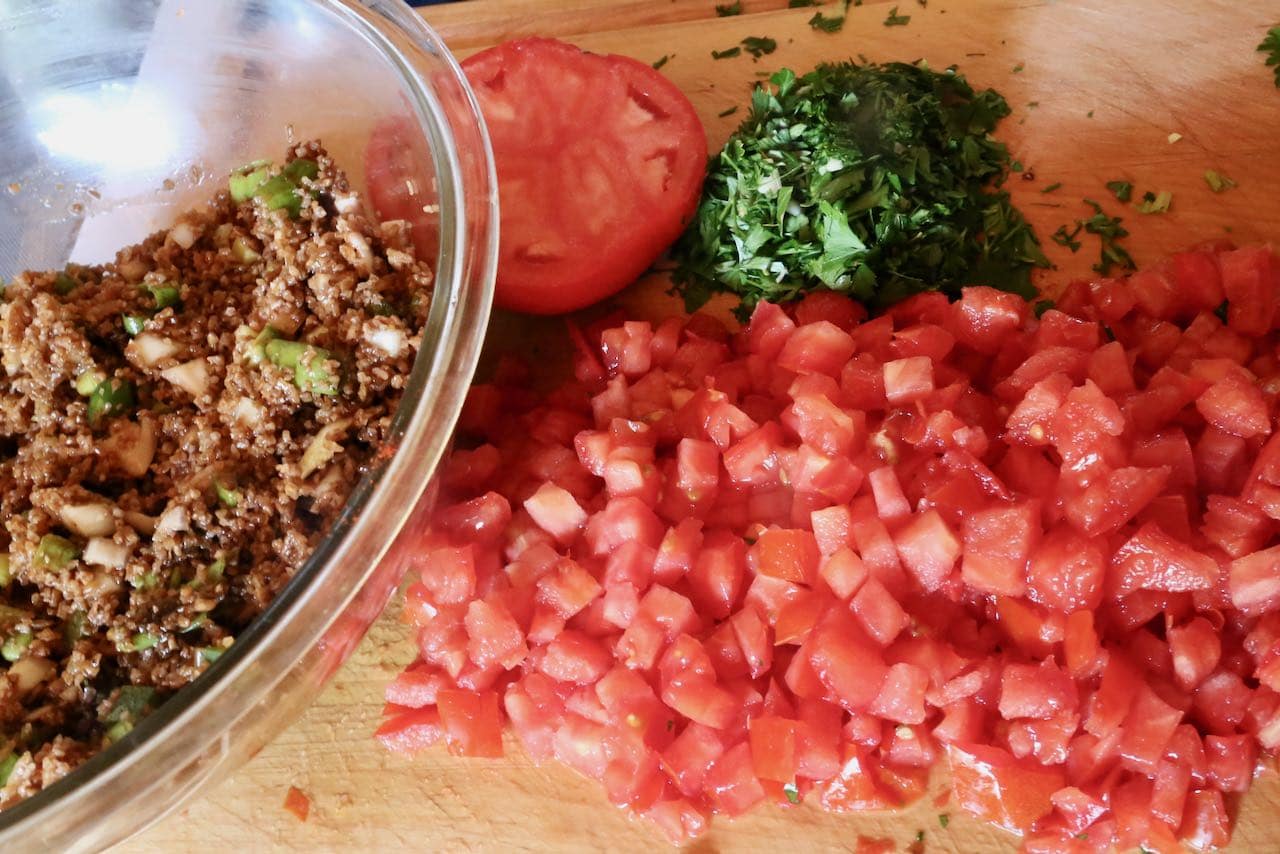 Best Kisir Recipe: Add chopped tomatoes and parsley.