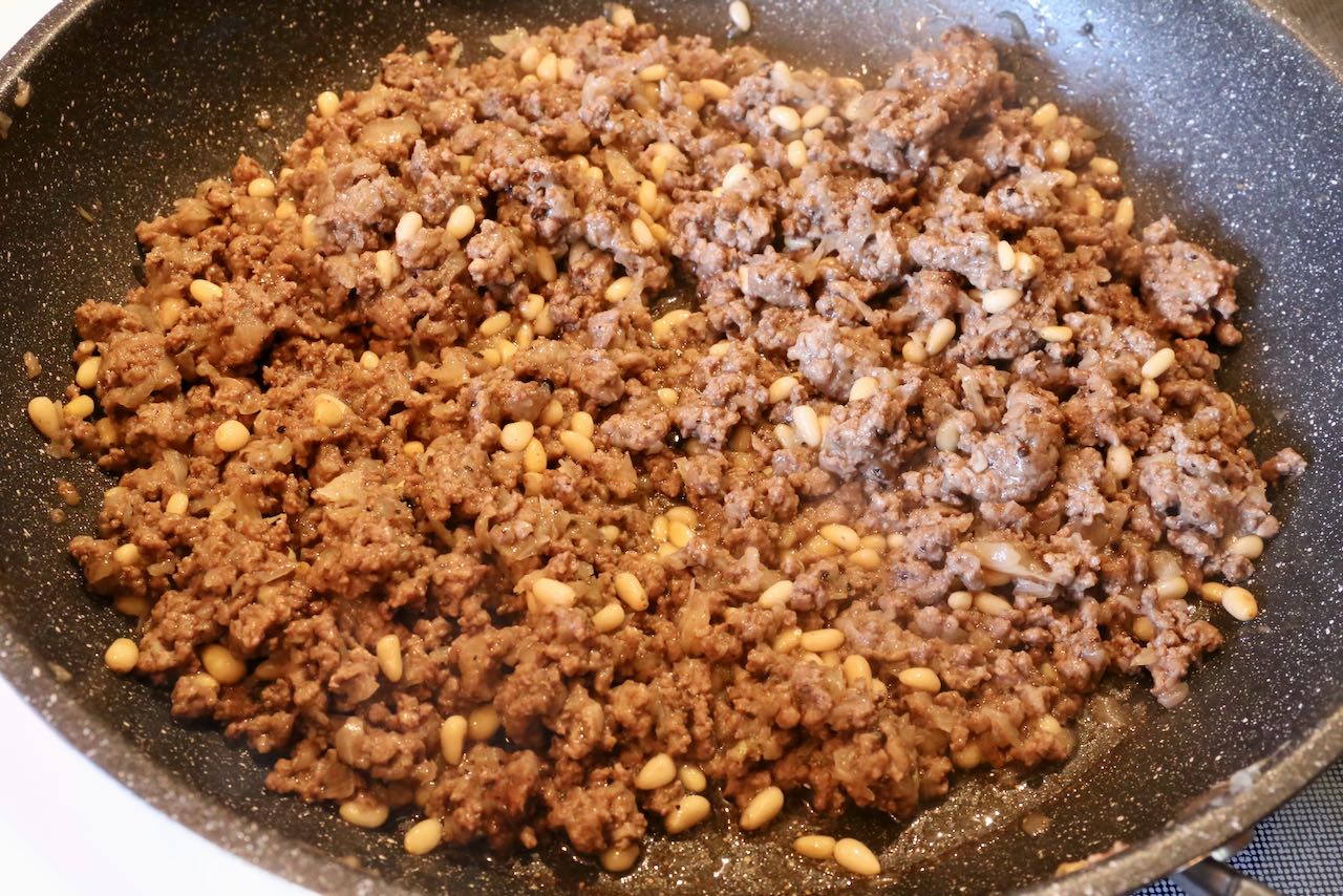 Traditional Lebanese Kibbeh filling featuring minced meat, spices, onion and pine nuts.
