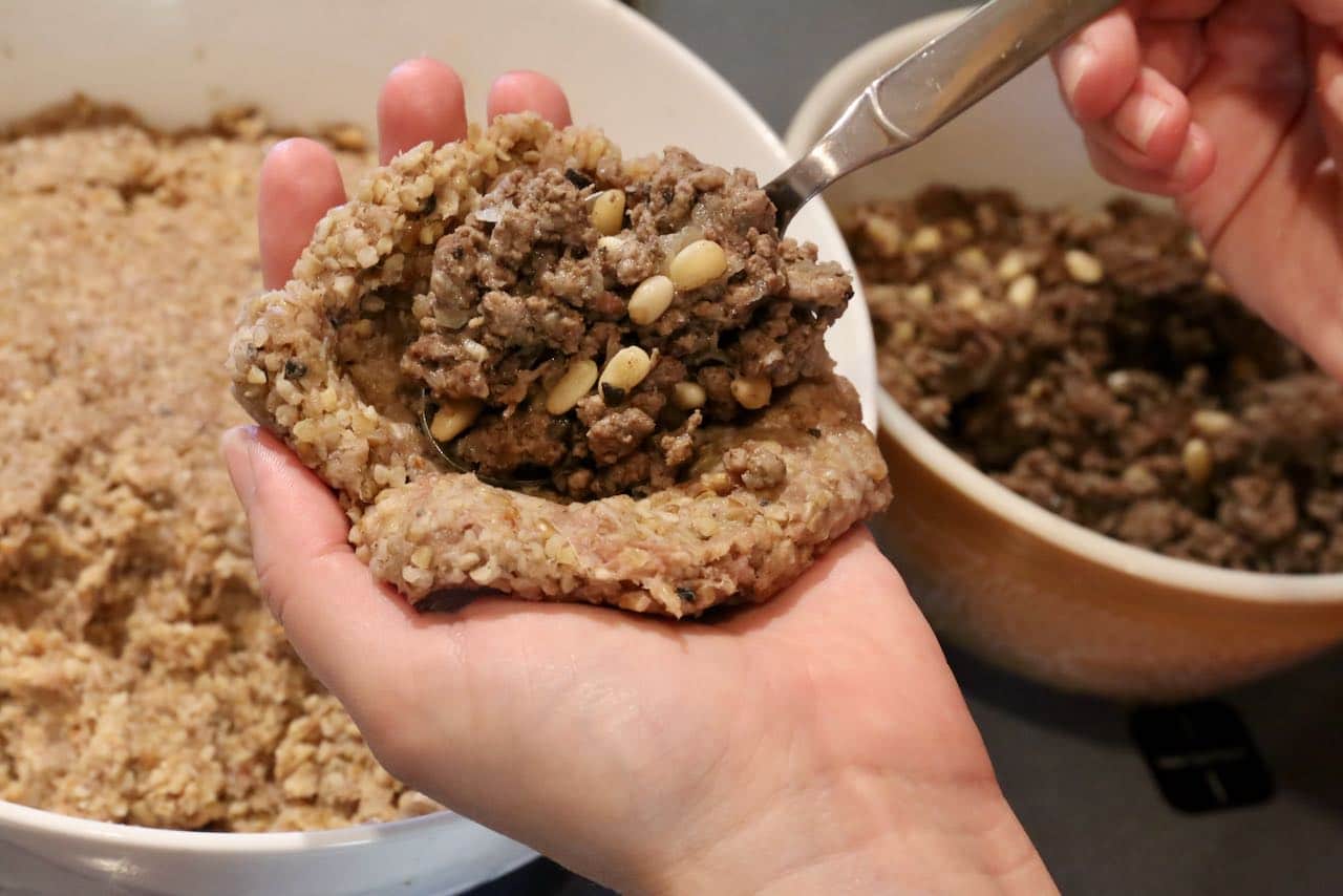 Fill Fried Kibbeh with cooked minced beef filling. 